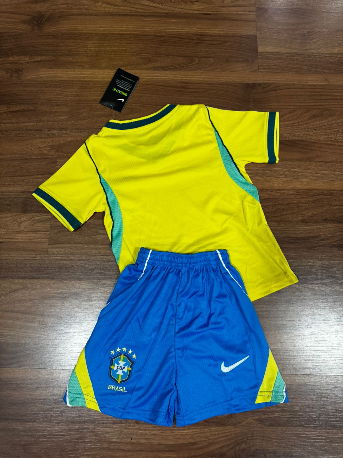 Conjunto Infantil Brasil I 2026/27 Nike Amarelo