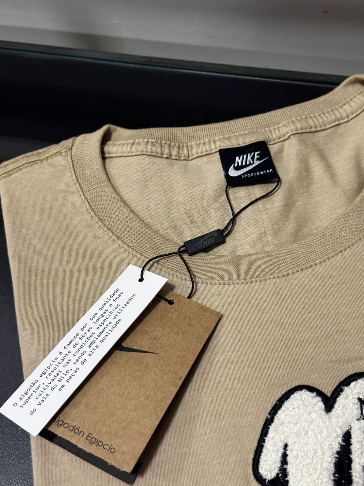 Linha strech americana Nike Bege