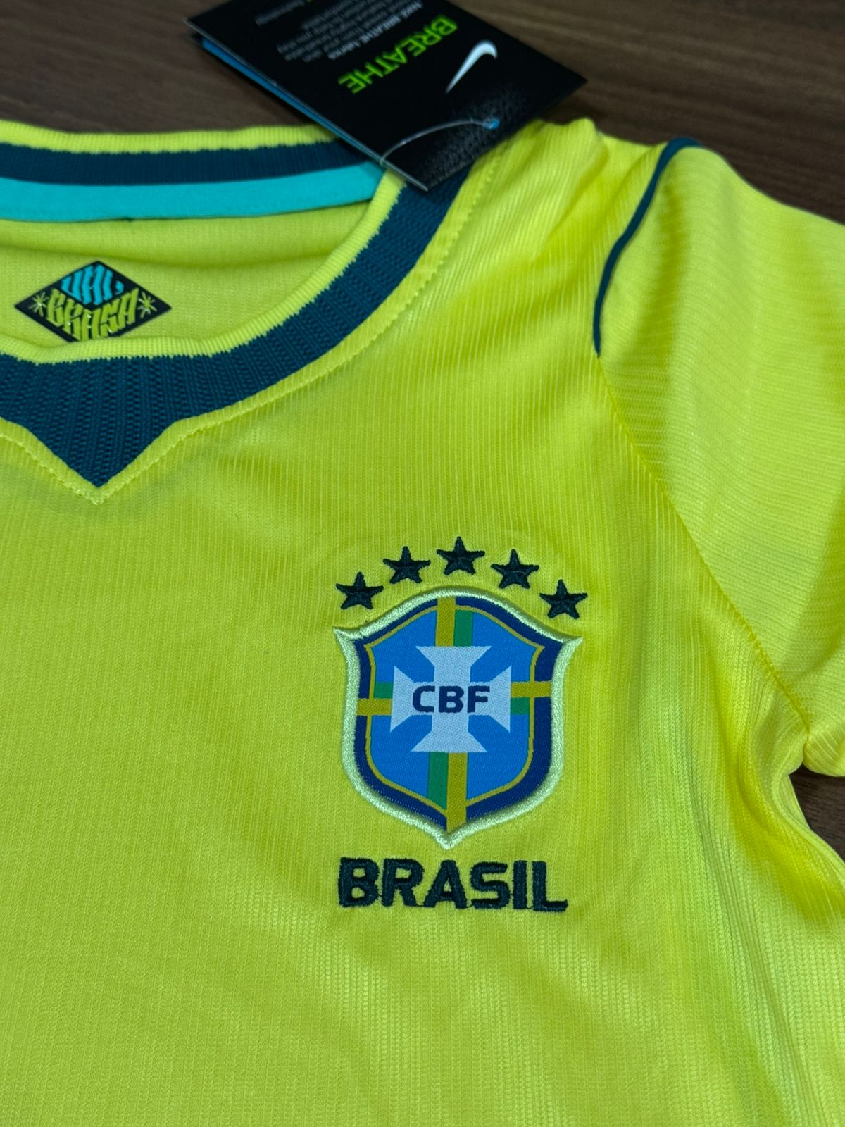 Conjunto Infantil Brasil I 2026/27 Nike Amarelo