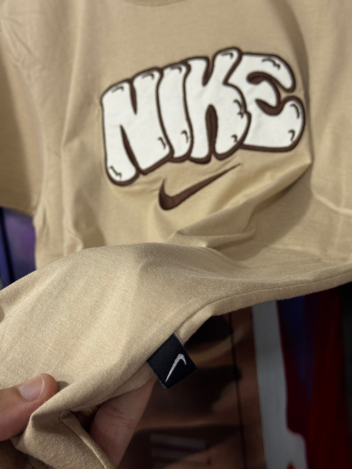 Linha strech americana Nike Bege