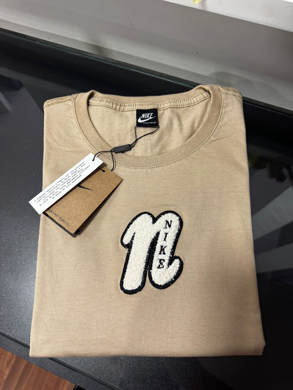 Linha strech americana Nike Bege