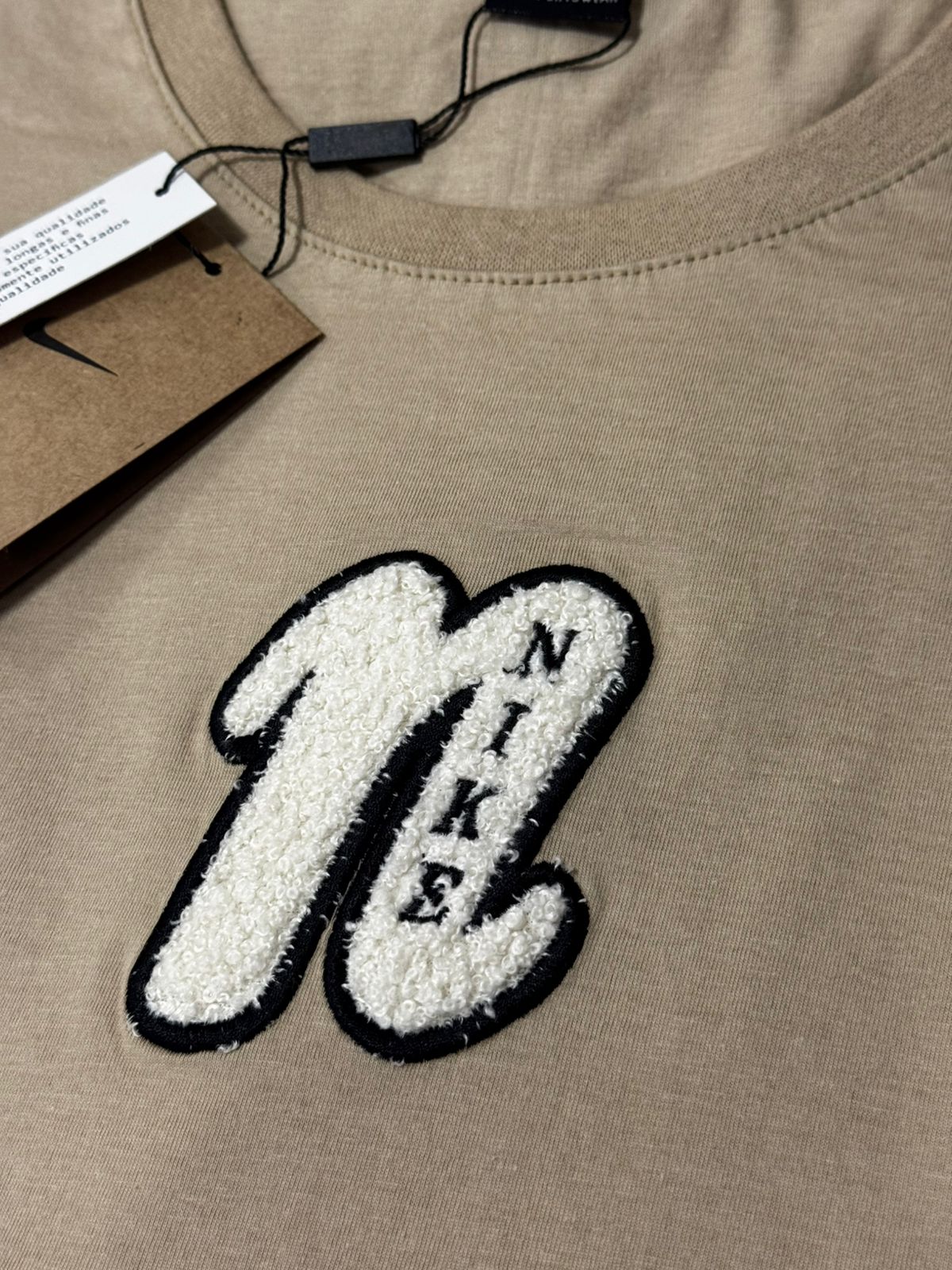 Linha strech americana Nike Bege